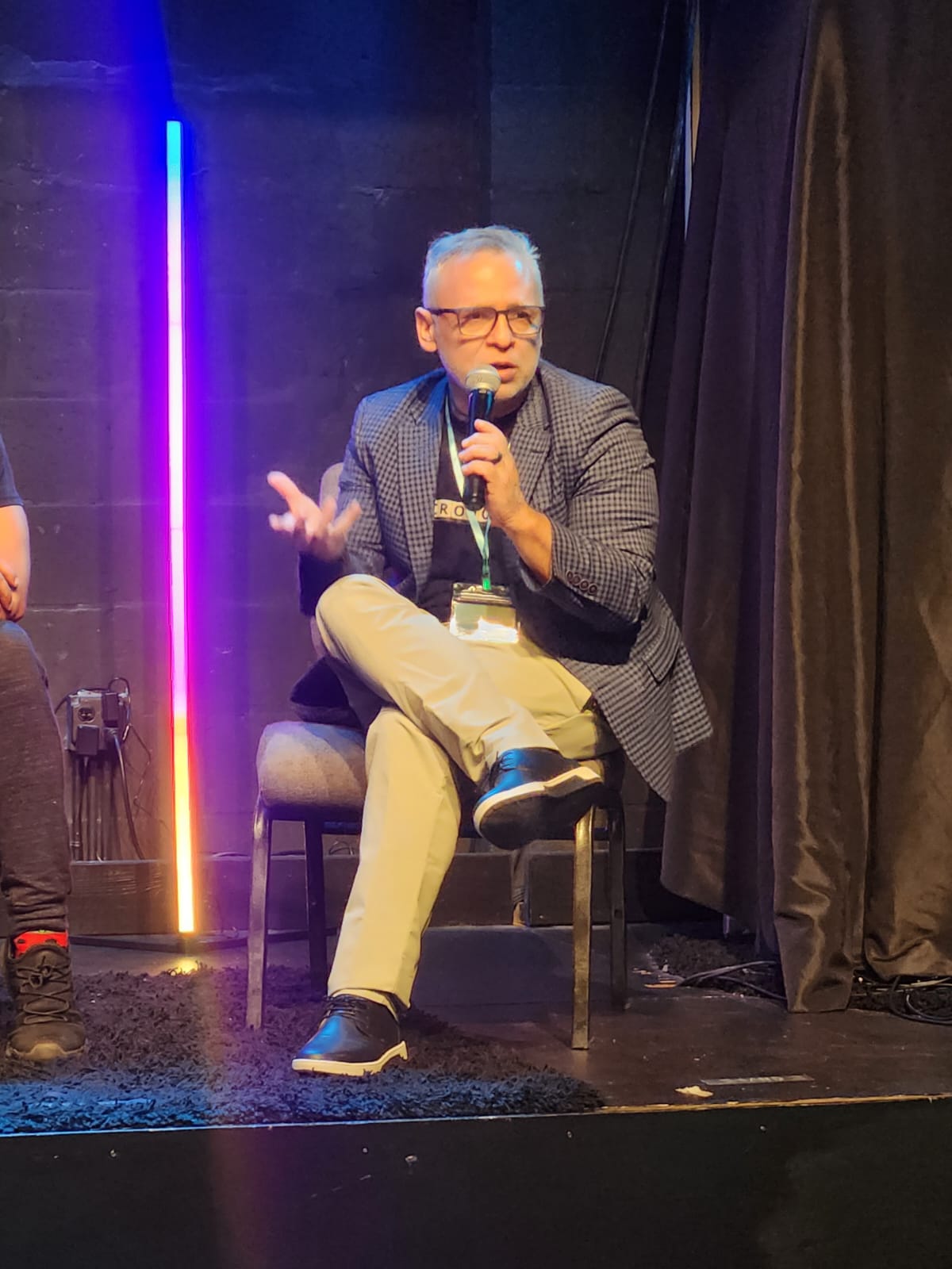 Cesar Marin answering a question during a panel discussion